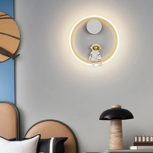 Astronaut Ring Wall Lamp — the little spaceman sitting in a halo of golden light 🚀🌕✨