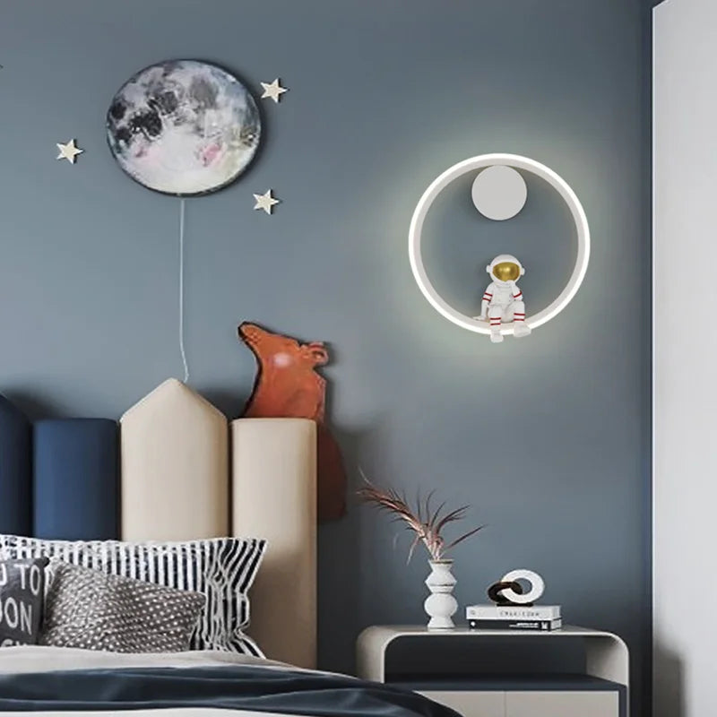 Astronaut Ring Wall Lamp — the little spaceman sitting in a halo of golden light 🚀🌕✨