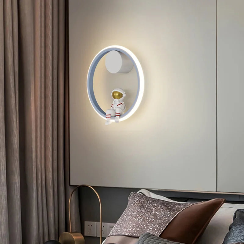 Astronaut Ring Wall Lamp — the little spaceman sitting in a halo of golden light 🚀🌕✨
