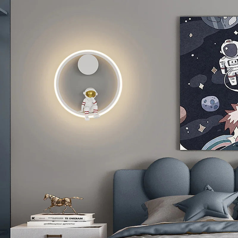 Astronaut Ring Wall Lamp — the little spaceman sitting in a halo of golden light 🚀🌕✨