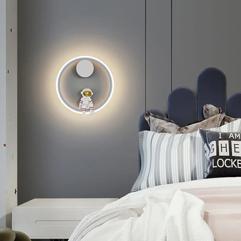 Astronaut Ring Wall Lamp — the little spaceman sitting in a halo of golden light 🚀🌕✨